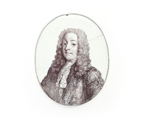A Battersea enamel plaque c.1753-56, the oval form printed in brown with a portrait of a Chancellor of the Exchequer, probabl
