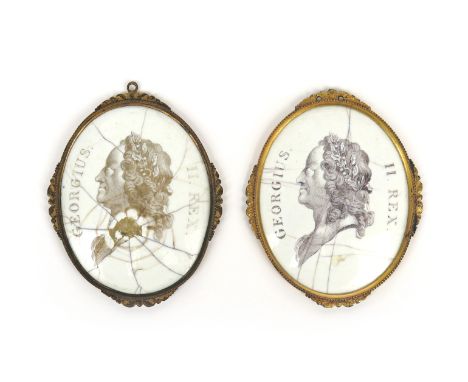 Two Battersea enamel portrait plaques c.1753-56, of oval form, engraved by Ravenet and printed with profile portraits of Geor