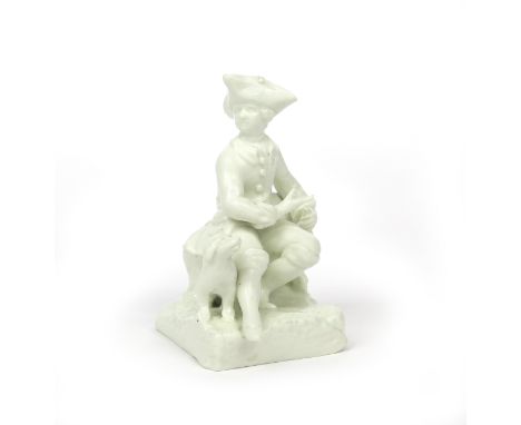 An early Bow white-glazed figure of a huntsman c.1752-53, seated on a low stump and filling the powder flask held in his left