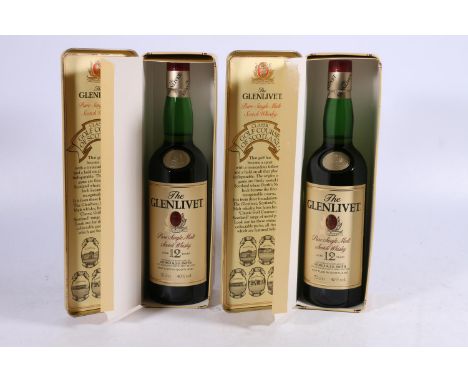 Two bottles of THE GLENLIVET 12 year pure single malt Scotch whisky 40% abv 70cl in Classic Golf Courses of Scotland tins: St