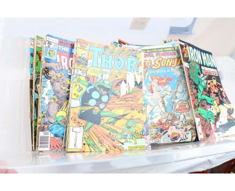 A box of vintage comics to include Marvel and DC Comics including Red Sonja (1976), The Mighty Thor (1981), Iron Man (1978), 