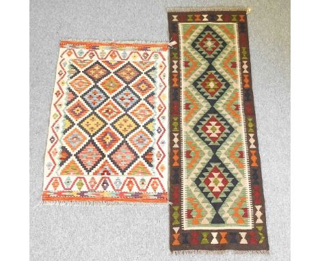 A Persian kilim, 126 x 82cm, together with a Persian runner, 191 x 61cm (2)