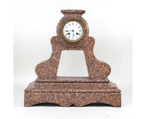 A pink granite cased marble mantel clock, with an eight day movement, 45cm high