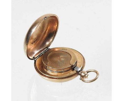 An early 20th century 9 carat gold sovereign case, of circular shape, with a spring holder, 24g, 35mm diameterOverall looks t