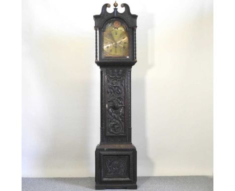 A George III oak and later carved longcase clock, the arched brass dial with moonphase and subsidiary seconds, signed Pattiso