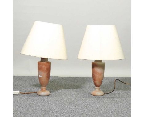 A pair of marble table lamps, with cream shades, 57cm high overall (2)Overall condition is complete and solid. The surfaces h