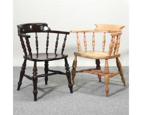 A light elm smoker's bow armchair, together with a stained oak smoker's bow armchair (2)