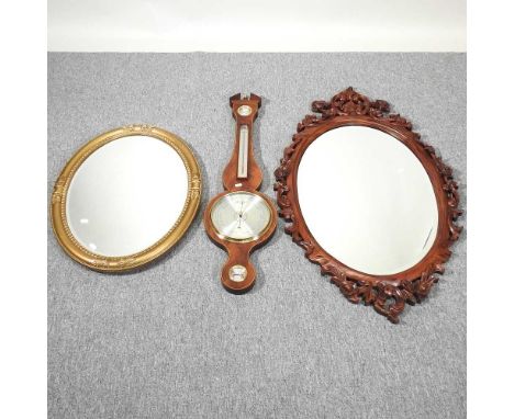 A modern mahogany cased barometer, 93cm high, together with a hardwood framed wall mirror, 112 x 69cm and a gilt framed wall 
