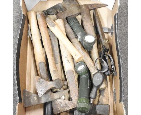 A collection of vintage tools, to include hand axes and pick axes