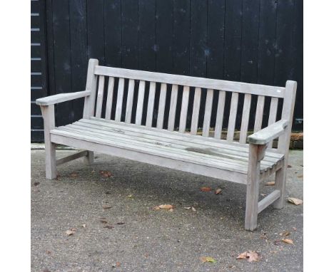 A teak garden bench, with a slatted wooden seat196w x 60d x 90h cm