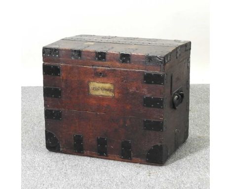 A 19th century military metal bound oak trunk, bearing a brass plaque 'Captain Hardy' and painted lettering 'Lt Colonel J.B. 