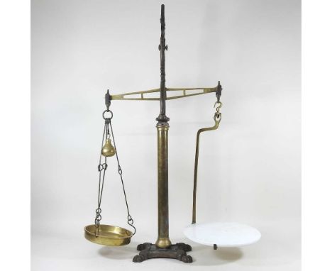 A large 19th century Librasco cast iron and brass balance scale, 89cm high, together with a tan leather case by Finnigans (2)