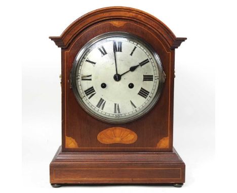 An early 20th century mahogany cased bracket clock, with a silvered dial, 39cm high