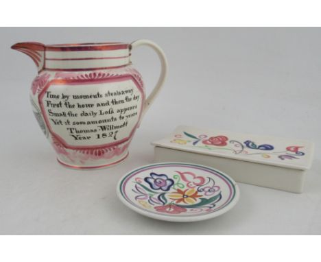 A 19th century English porcelain luster jug, printed with a view of Ironbridge and text, height 7ins together with two pieces