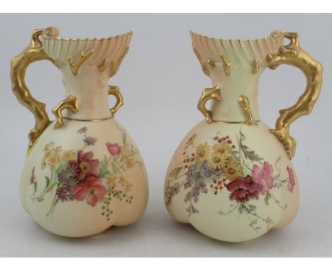 A pair of Royal Worcester quarter lobbed blush ivory coral jugs, decorated with flowers, shape No 1507, height 9ins&nbsp;Cond