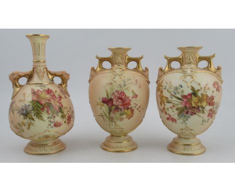 A pair of blush ivory vases, decorated with flowers, shape No 1654, height 8ins, together with a Royal Worcester blushed ivor