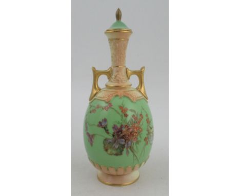 A Royal Worcester covered vase, decorated with flowers to a green ground, shape No 1575, finial af, height 8ins&nbsp;Conditio