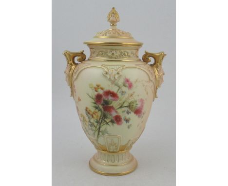 A Royal Worcester blushed ivory vase, with associated cover, decorated with flowers, with masked handles, shape No 1617, heig