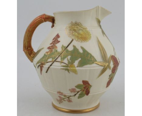 A Royal Worcester glided ivory jug, painted with shot silk colours, shape No 1185, height 7ins&nbsp;Condition Report:  Some v