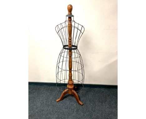 A late nineteenth century style mannequin with metal frame on stand, height 153 cm.