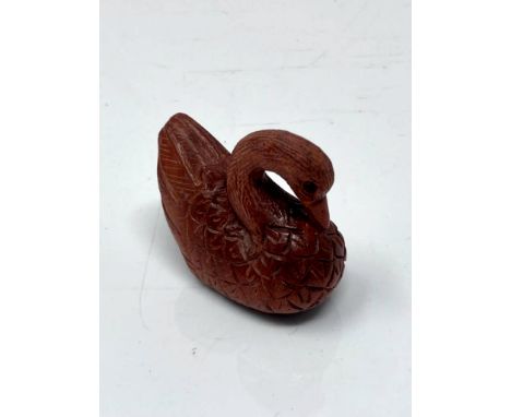 A Japanese carved fruitwood netsuke - Swan. 