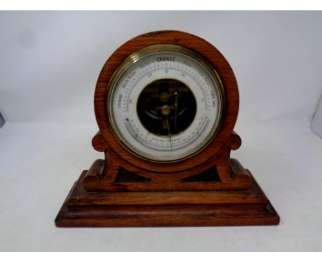 An early 20th century oak holosteric barometer    
