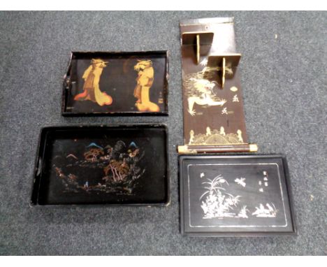 Four pieces of Japanese lacquer ware to include mother of pearl inlaid tray, wall shelf etc   