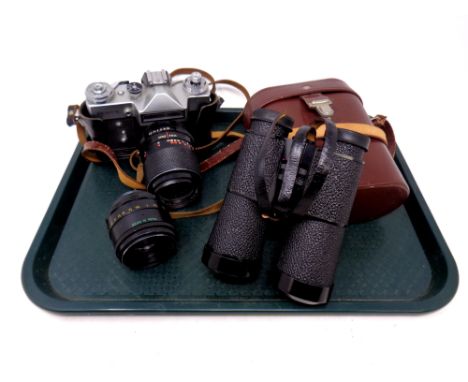 A Zenit-E camera together with a pair of Karl Zeiss binoculars in carry case  