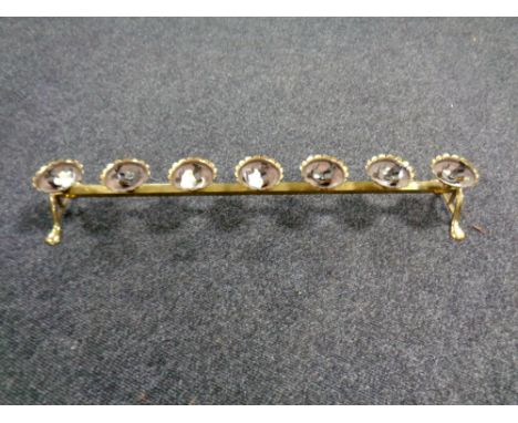 Late Victorian Ecclesiastical Seven- Light Brass Candelabrum, of unusual low and horizontal form, 65cm wide  