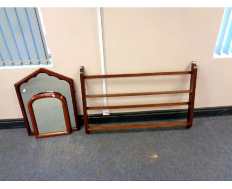 Two antique mahogany framed mirrors together with a wooden wall shelf, width 103 cm 