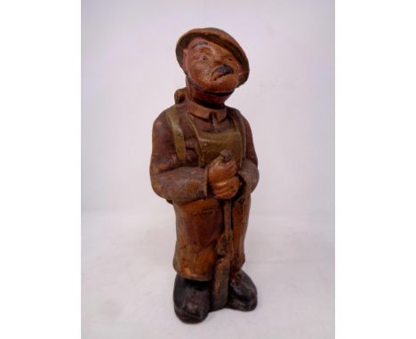 An early 20th century canvas figure depicting a first world war soldier 