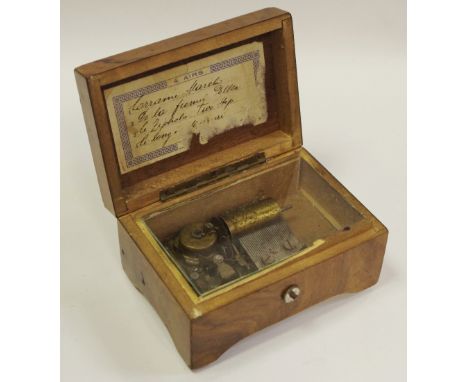 A 19th century walnut music box, playing four airs on cylinder and comb, c.1870