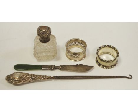 An Edwardian silver butter knife, Hilliard &amp; Thomasson, Birmingham 1906; a George V silver mounted scent bottle, Birmingh