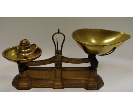 A gilt metal W. Avery set of scales to weigh 4 Lb, with various weights; c.1900 