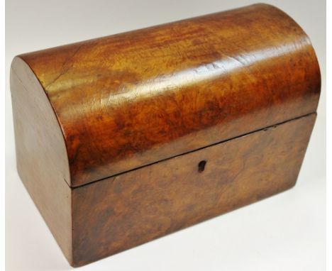 A Victorian burr walnut domed rectangular tea caddy, hinged cover enclosing a pair of lidded compartments, c.1850