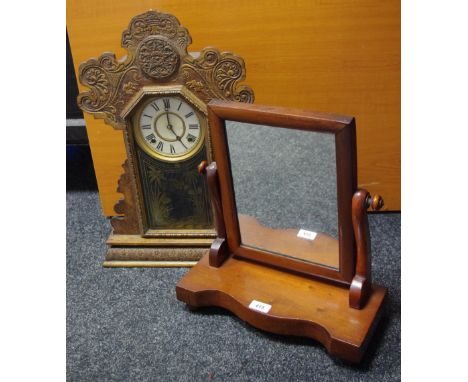 An early 20th century American Ansonia type mantle clock, Roman numerals with  twin winding holes; a 19th century mahogany dr