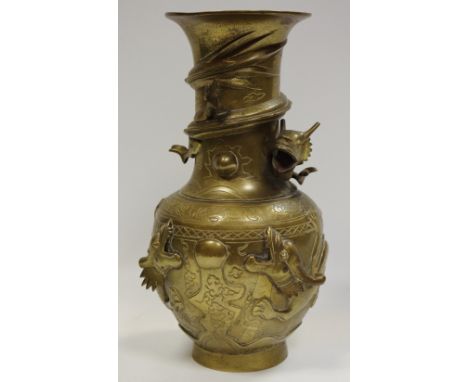 A Chinese bronze vase, cast and applied with ferocious dragons, seal mark, 19th/early 20th century