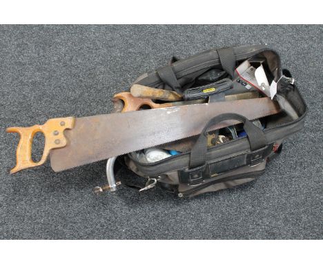 A Stanley tool bag containing antique and later hand tools 