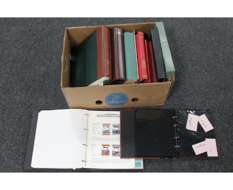 A box of a quantity of stamp albums containing a large collection of assorted stamps, first day covers 