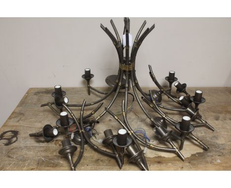 A bespoke ceiling light with five matching wall lights 