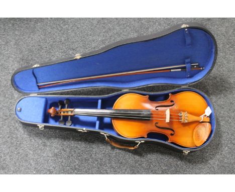 A Viola 16'' back labelled Skylark with shaped case and bow