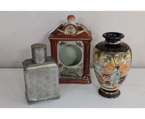 An oriental pottery mantel clock case with character marks to base, Japanese vase with hand painted decoration and a pewter f