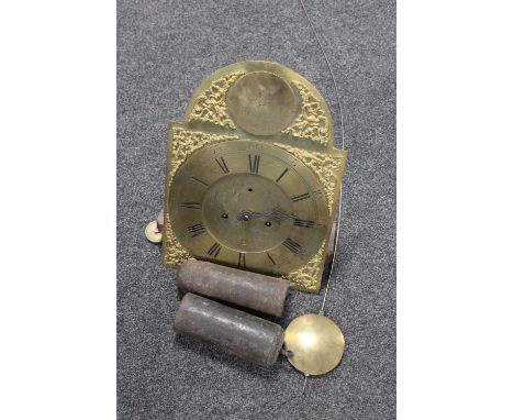 A brass longcase clock movement signed Hawthorn, Newcastle, with pendulum and weights 