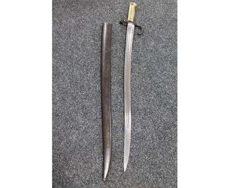 A 19th century French Chassepot bayonet in scabbard
