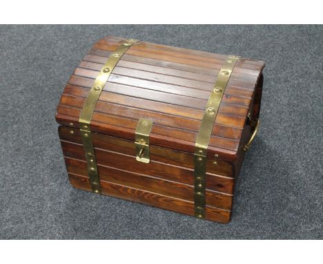 A brass bound pine trunk 