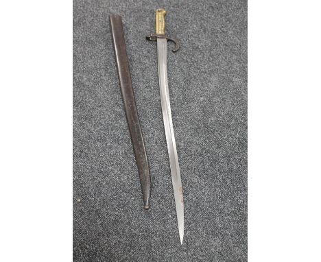 A 19th century French Chassepot bayonet in scabbard