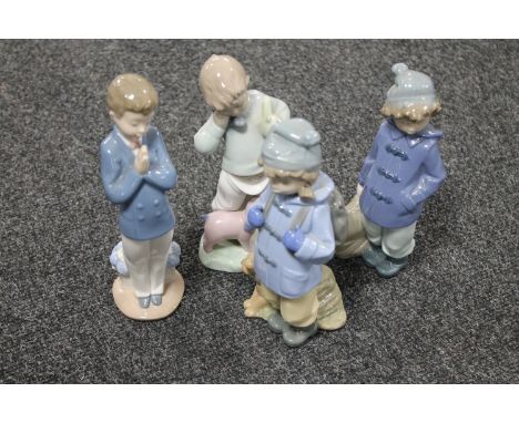 Four Nao figures of children 