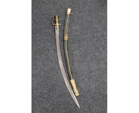 An Indian brass mounted sword in scabbard 