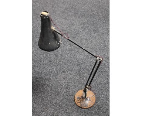 A vintage metal angle poised lamp 