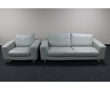 A contemporary grey leather two seater settee with matching armchair 